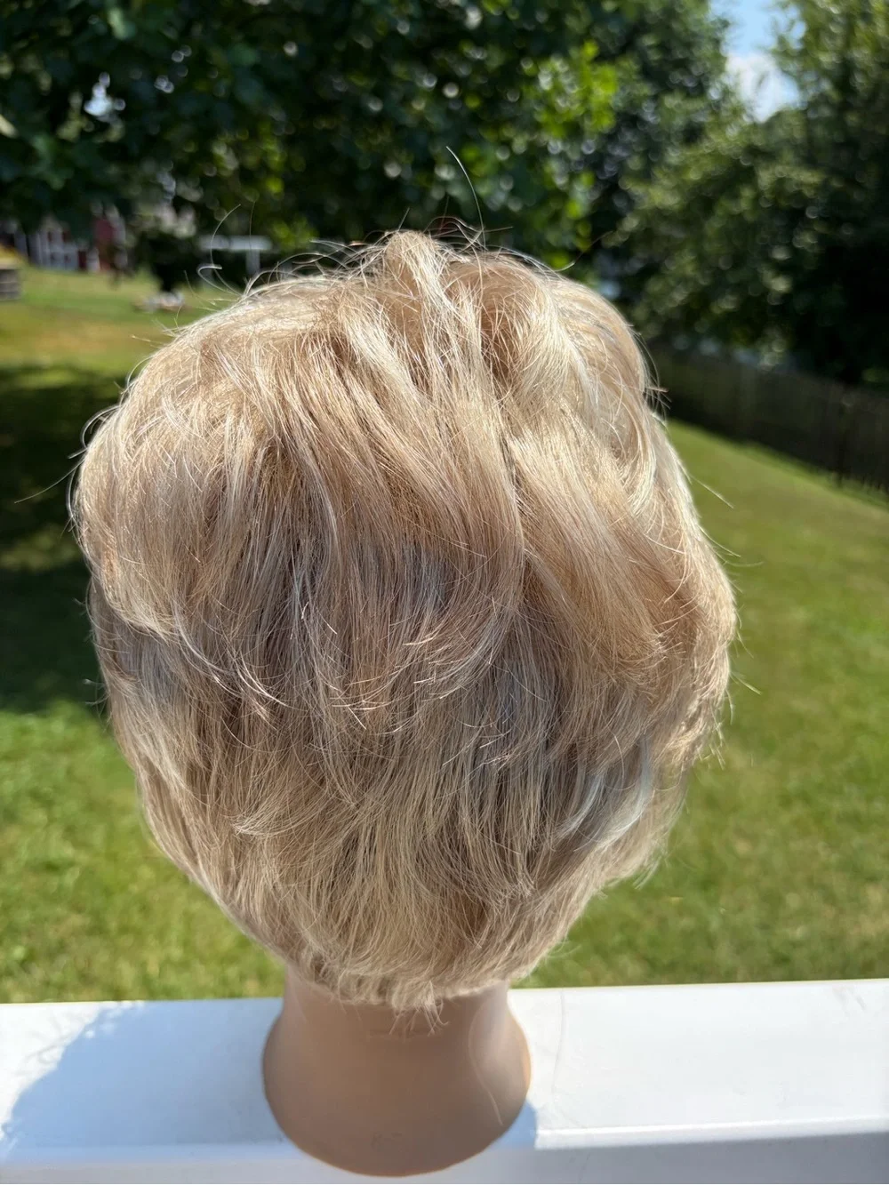 Short blonde wavy pixie cut synthetic wig with bangs